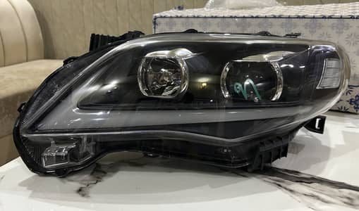 Toyota Corolla 08-12 Brand New Nike Head Light