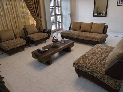 Elegant Seven Seater Sofa Set & Wooden Centre Table