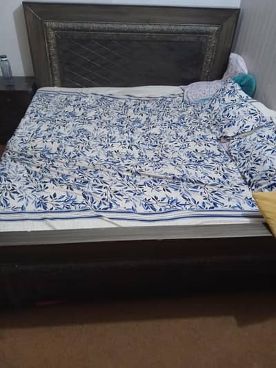 double bed with side table