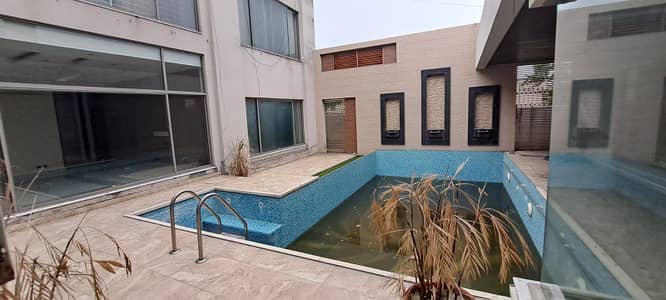 2 Kanal Slightly Used Luxury Ultra-Modern Design Most Beautiful 6-Bedroom Swimming Pool Bungalow For Rent at Prime Location of DHA Lahore Near To Park Masjid & Commercial Market .