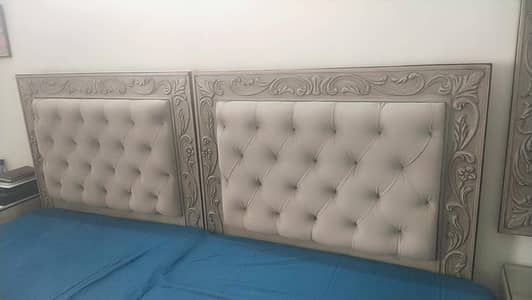 2 single beds alike with 2 eight inches Mattressee and a mirror