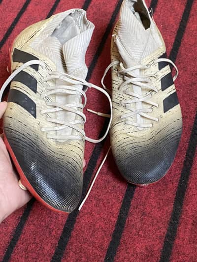 Football shoes (studs )