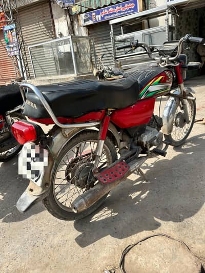 Honda 70cc red colour good condition