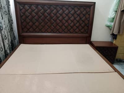 double bed with 2 side tables