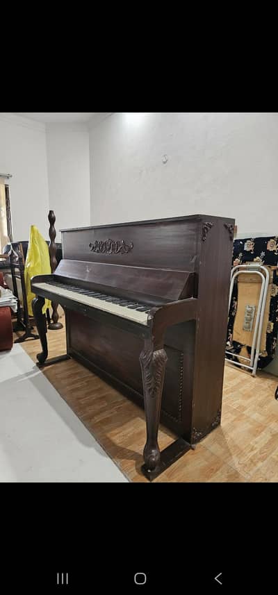 Antique upright piano art piece