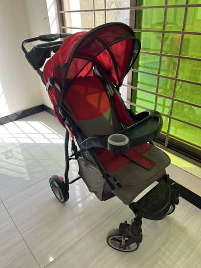Red & black combo stroller for kids