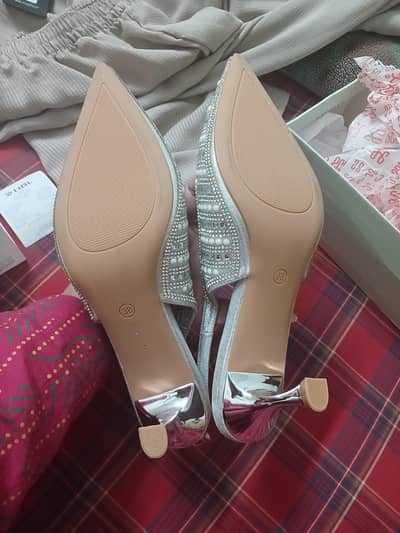 New 38 size Stilettos white silver color