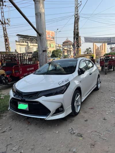 Toyota Corolla Altis Grande White total Genuine