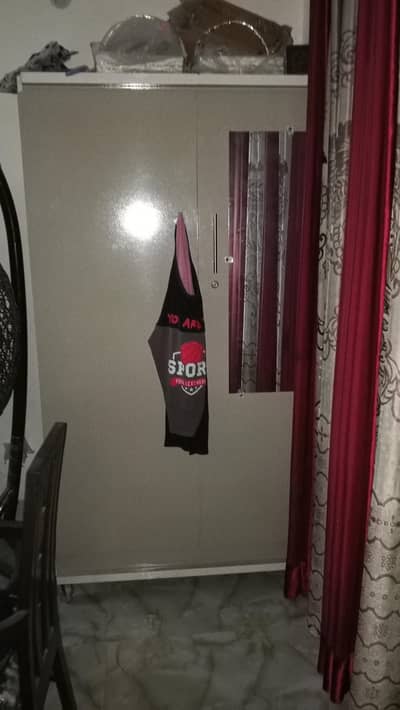 NEW TWO DOOR WARDROBE WITH ATTACHED MIRROR LOCK AND KEYS AND WHEELS