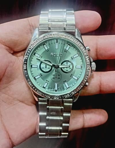 Mens watch stainless steel conditon 10/10 folio watch green interior