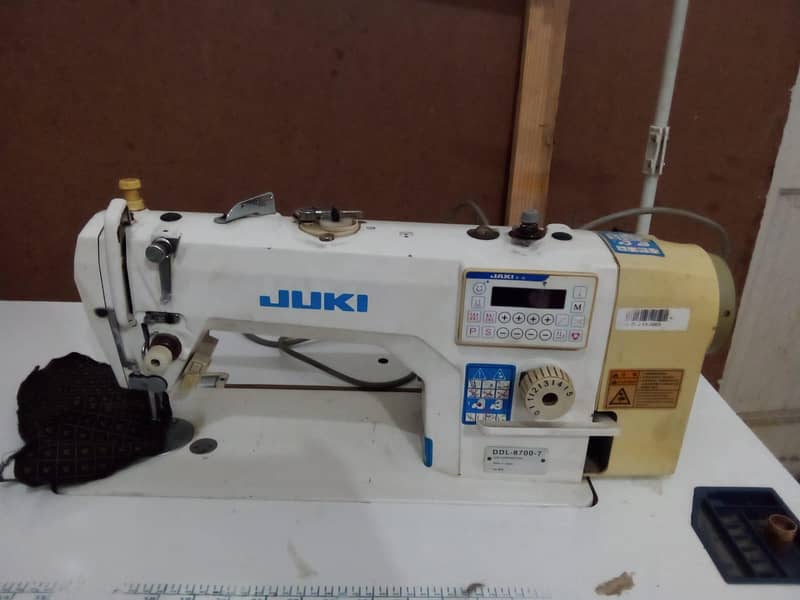 sewing machine 12