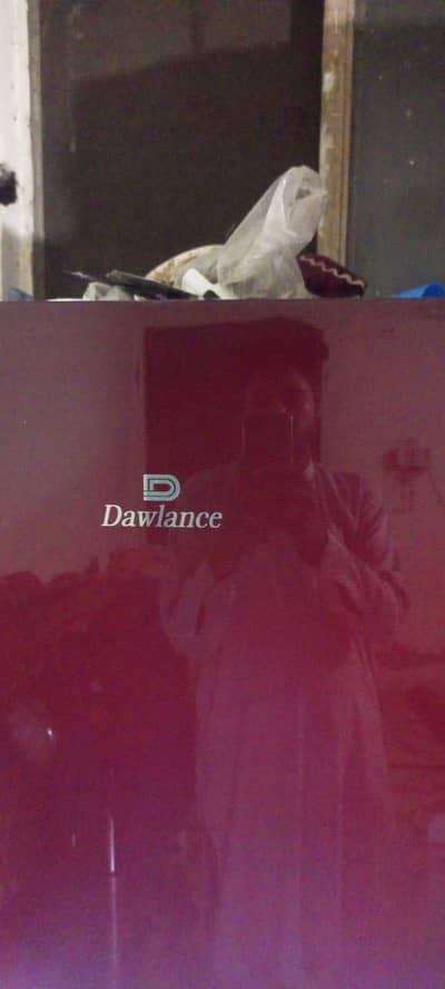 dowlance fridge for sale with guarantee card tottaly janiun condition