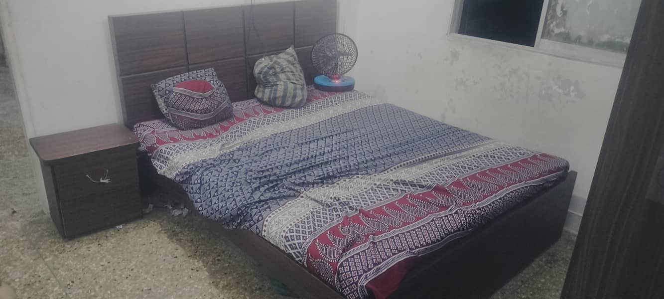 bed and side table and wardrobe 0