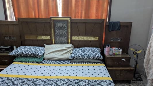 complete bedset with bed, wardrobe, dressing, side table & cupboard.
