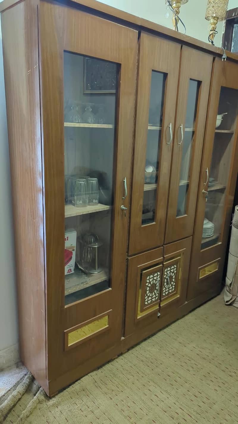 complete bedset with bed, wardrobe, dressing, side table & cupboard. 7