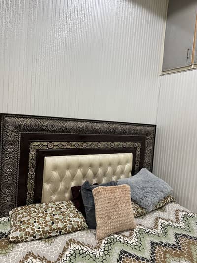 Bed and normal used mattress