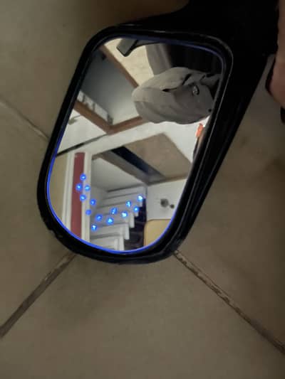 Charade Side mirror with auto adjustable and indicator blink in mirror