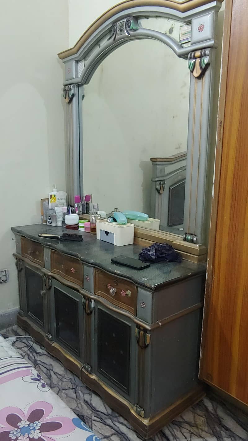 1 double bed without matress 2 side table 1 dressing table 5