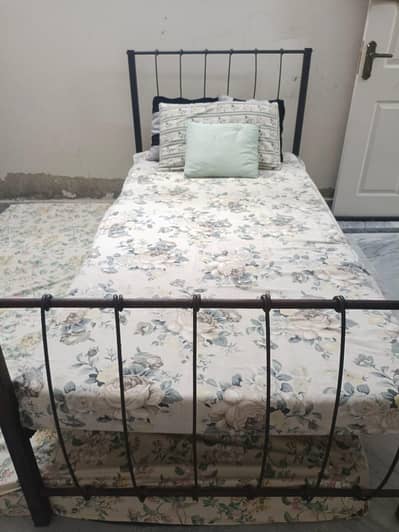 single iron bed