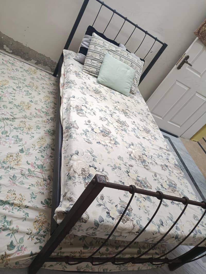 single iron bed 1