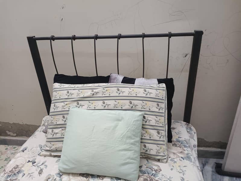 single iron bed 2