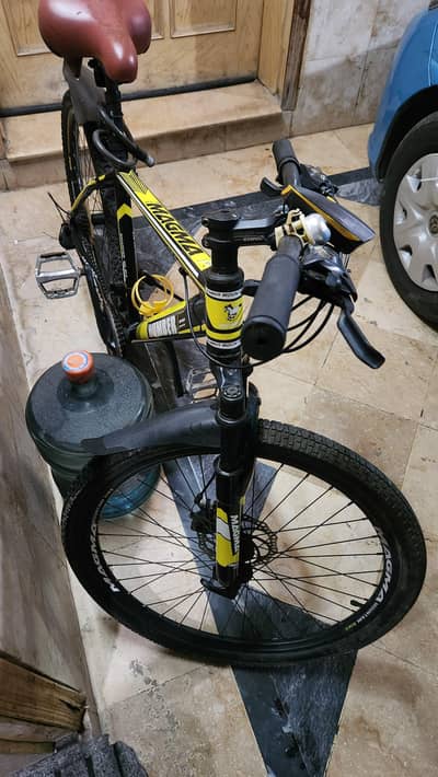 Magma Humber 26 Inches Hybrid Bicycle in Yellow