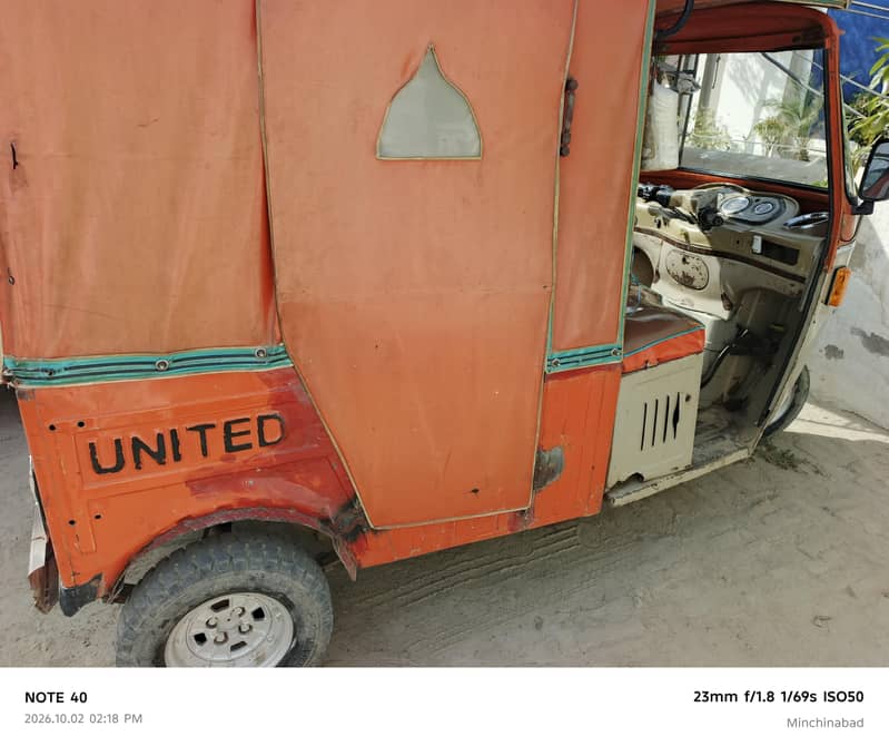 united auto riksha 5