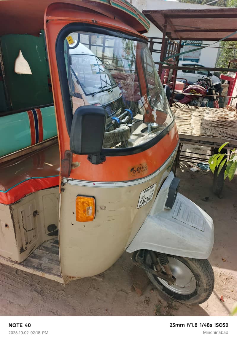 united auto riksha 12