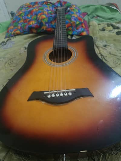 Acoustic guitar with adjustable truss rod