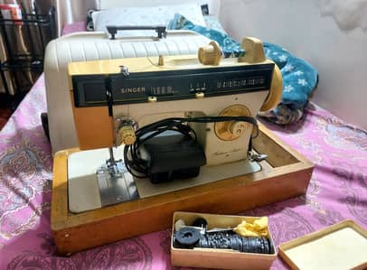 Electic motor singer machine