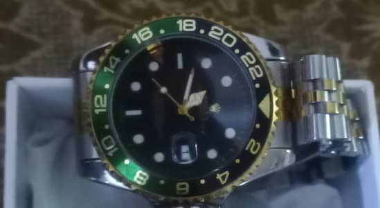 Rolex Golden and black watch