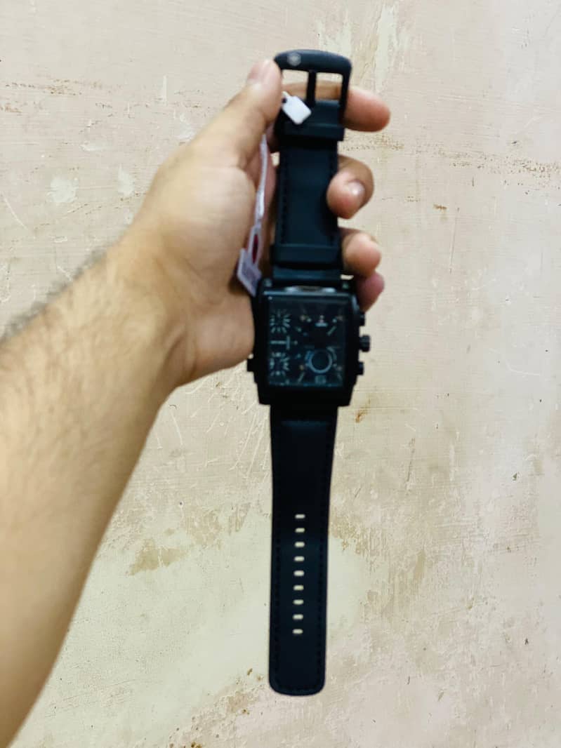 man watch branded 9