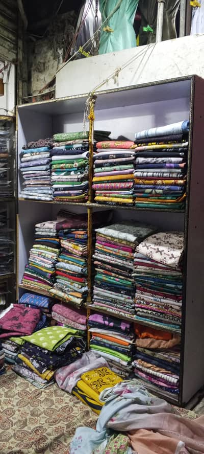 wood rack  2 Hein wall par 2 rack Hein 1 wood ka takhat he