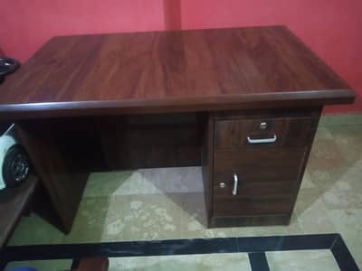 new office table along with two chairs