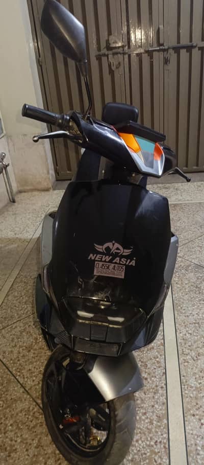 Urgently sale home used scooty