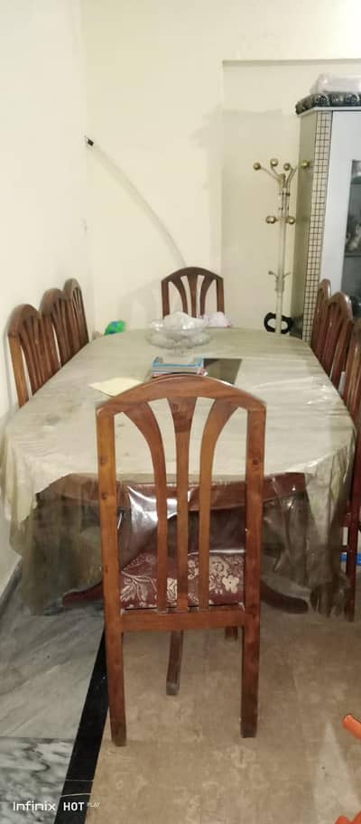 wooden dinning table with 8 chairs