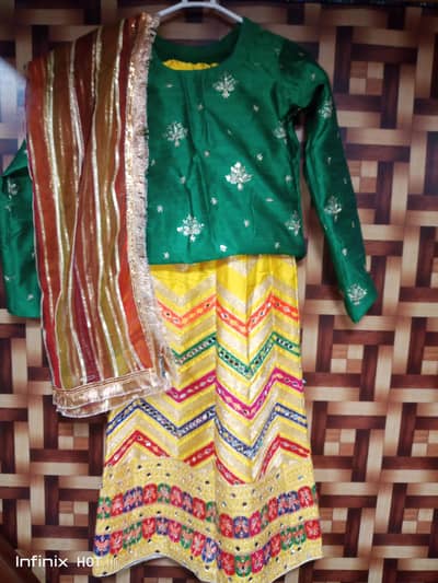 yellow color lehnga with green kurti and multi dupatta