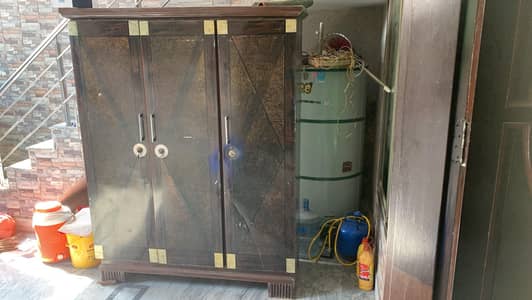 3-Door Metal Almirah / Wardrobe – Rs. 30,000