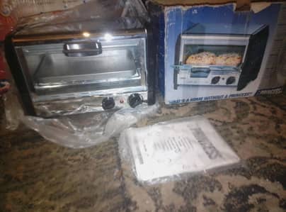 electric tostar oven and tea set (0.3. 1.2. 0.4. 3.9. 3.0. 5)