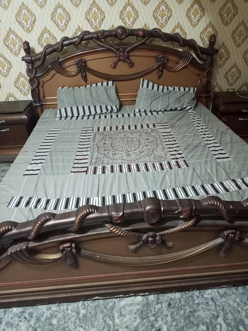 Bed with side table 0