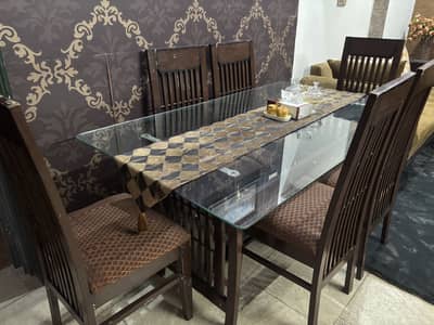 Dining table with glass top and 6 chairs
