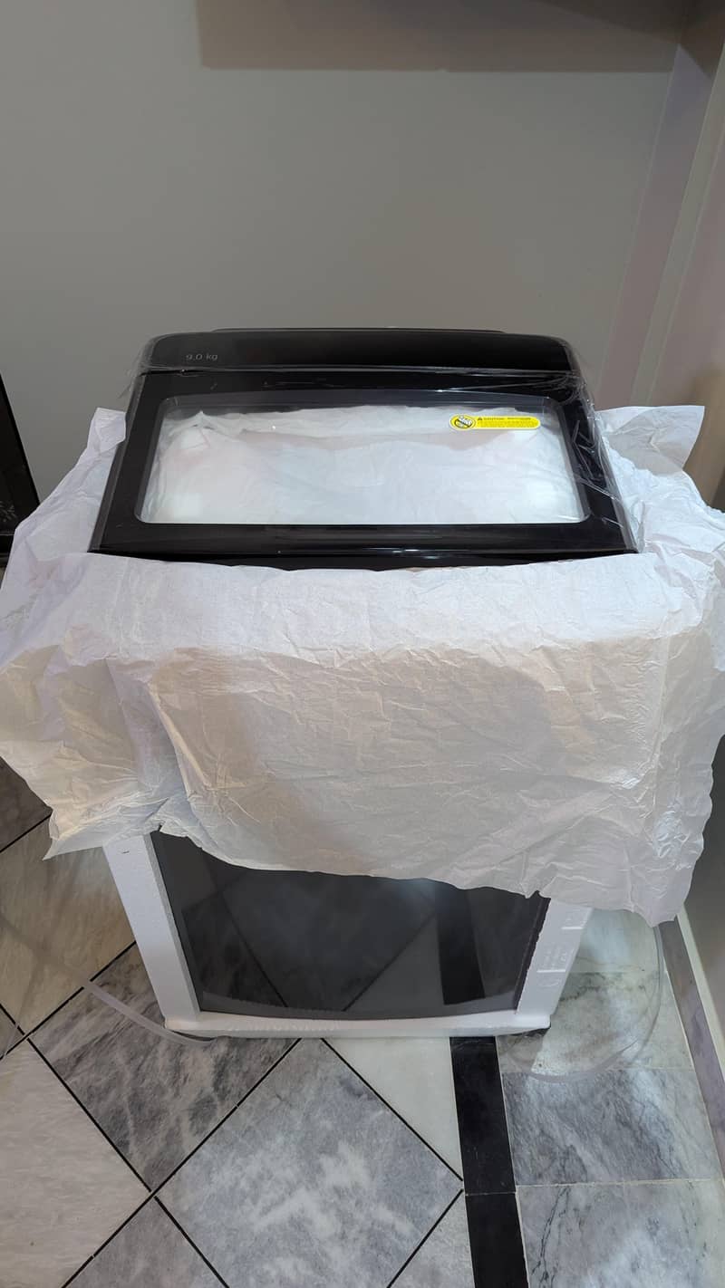 LG topp load automatic washing machine 4