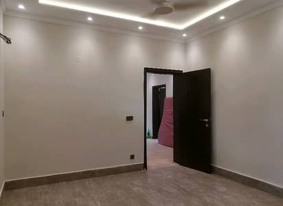 one Kanal Corner , House With Basement, Back Of Main Road, 30 Years Old
