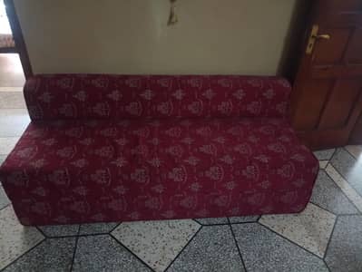sofa bed with rug