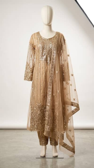 Elegant Champagne Gold Fancy Net Suit for Mehndi / Dholki
