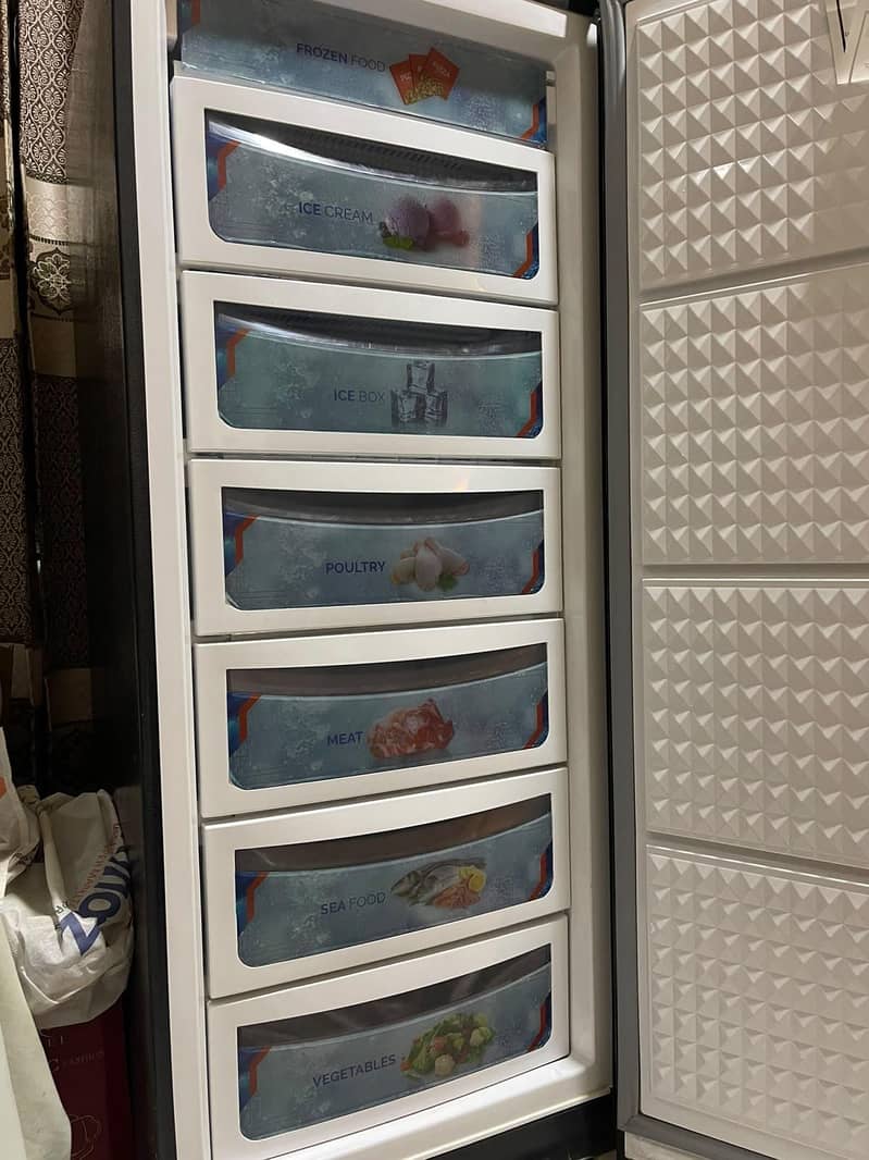 dawlance vertical freezer 1