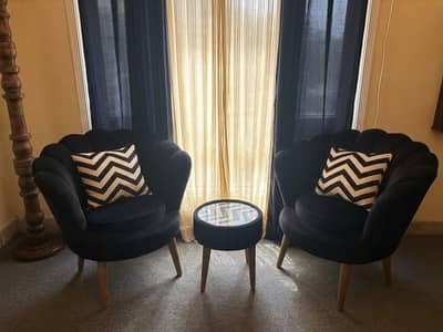 2 Sofa Chairs along with 1 Table