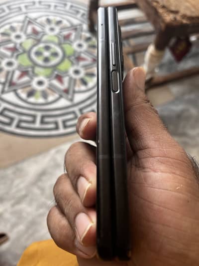 Samsung Z3 Fold and I phone 13
