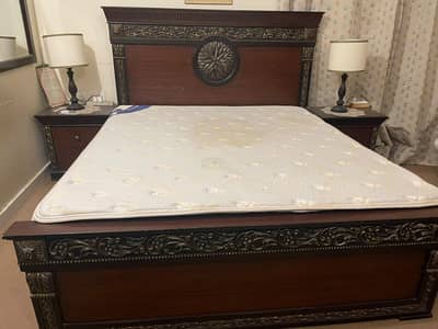 king size bed with side tables and mattress