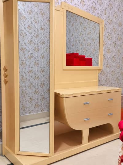 dressing table. showcase. bed with side tables